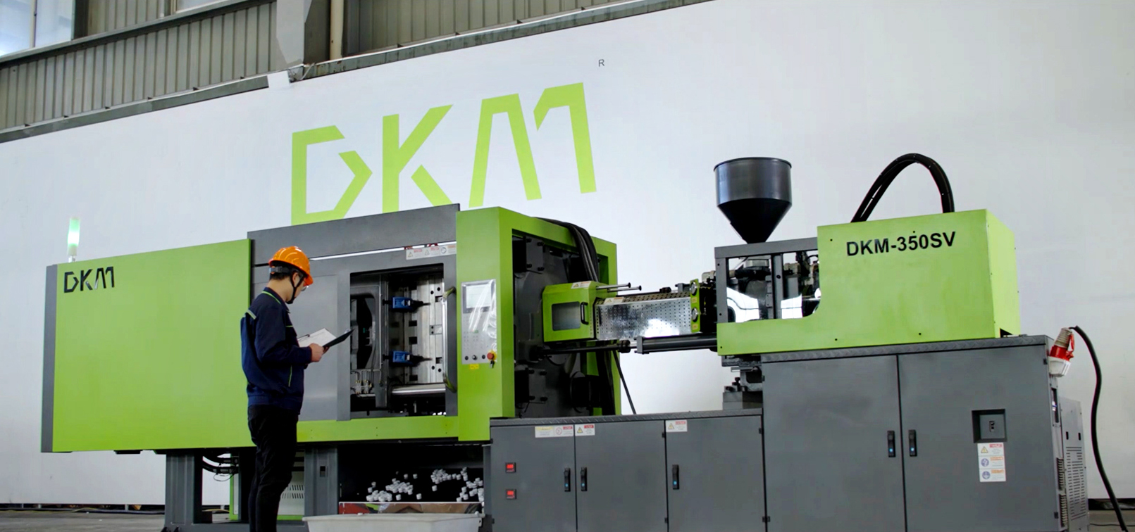 Milk bottle cap injection molding machine
